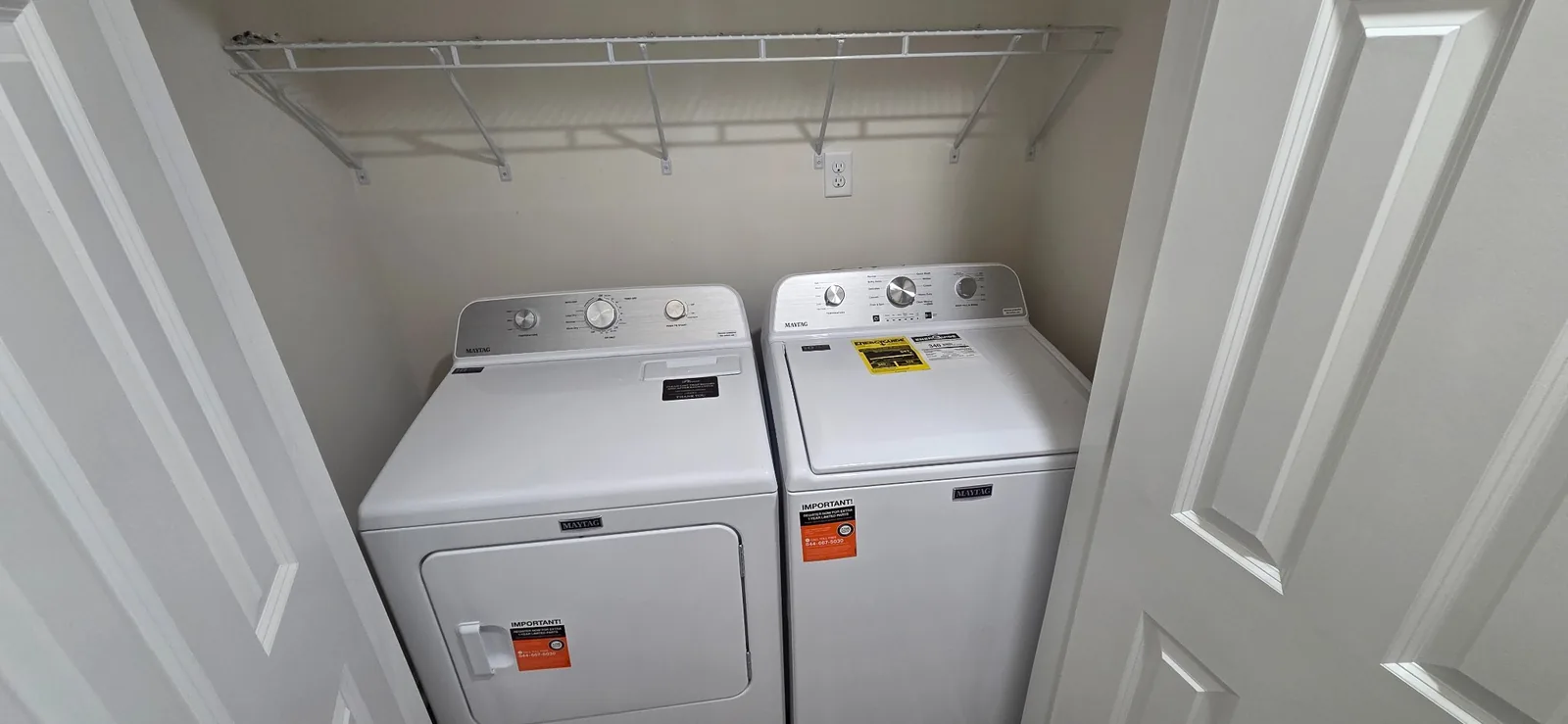 A washer and dryer installed in a closet inside a Marlboro apartment.
