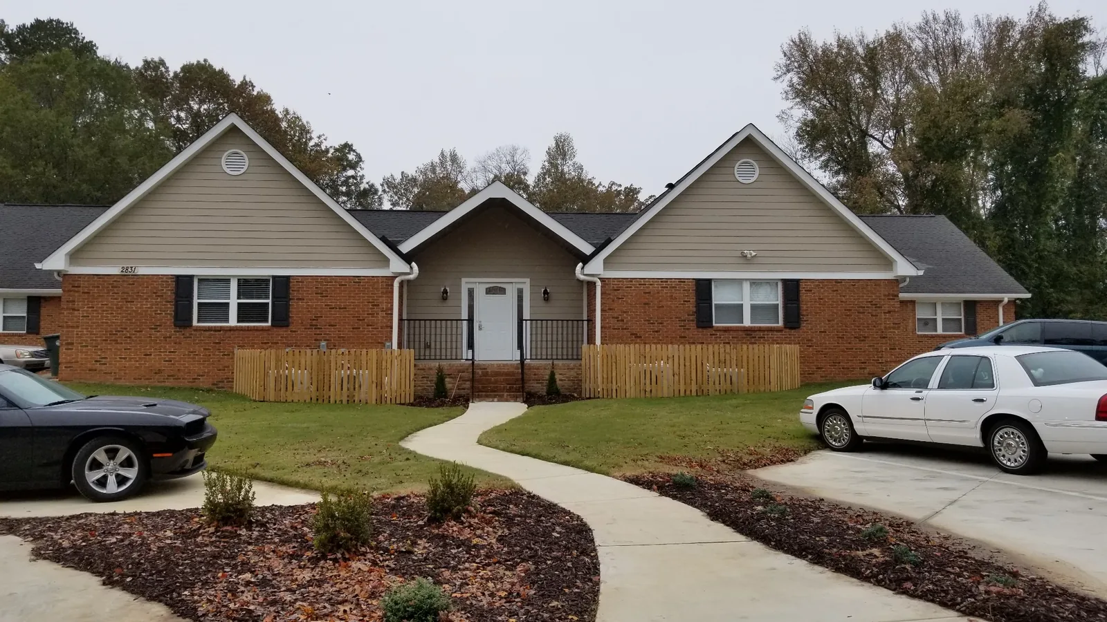 A Silverdale Senior Apartments building, brick and tan siding.